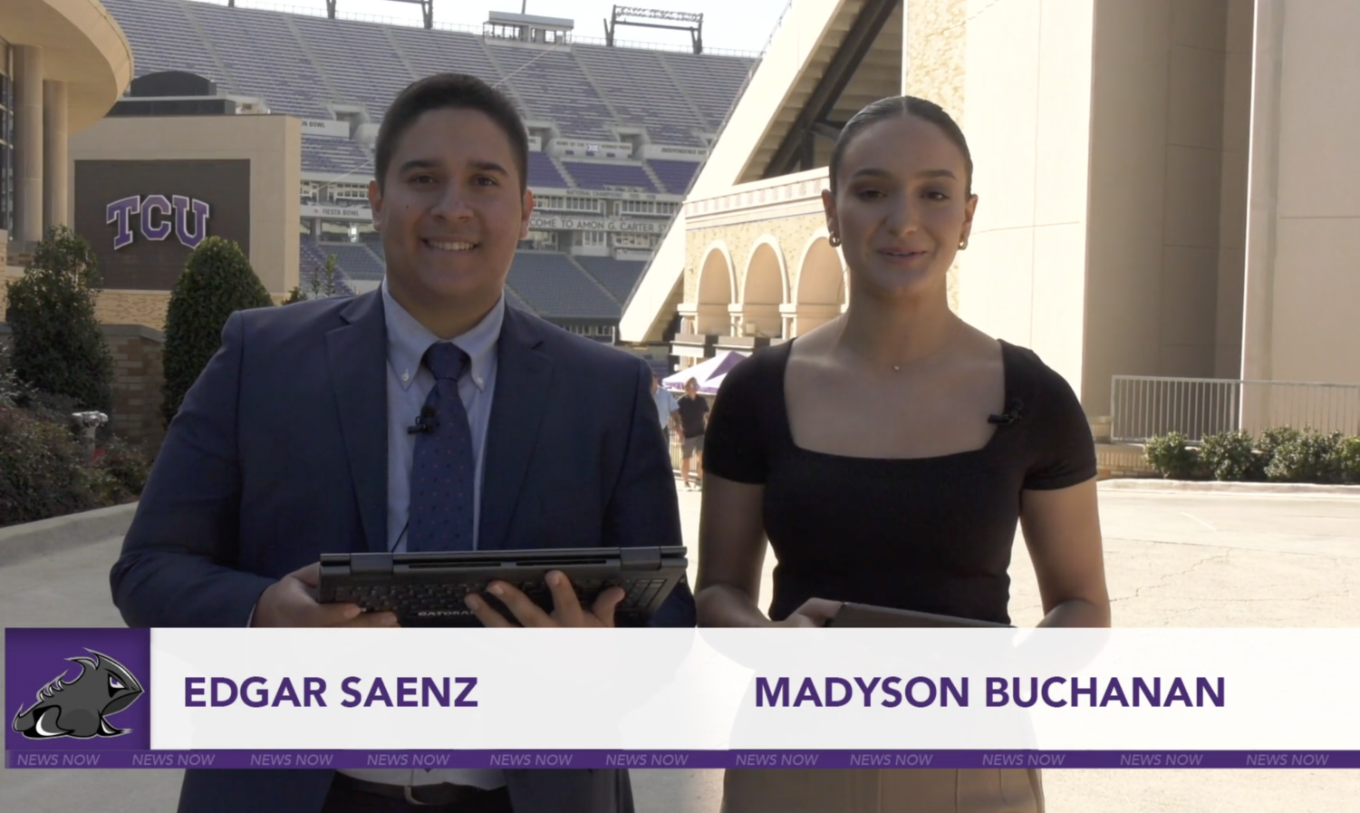 Two student journalists report from outside the T C U football arena. A graphic on screen identifies them as Edgar Saenz and Madyson Buchanan.