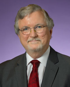 A headshot of Journalism Professor Tommy Thomason in 2012.