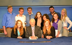 Bob Schieffer, surrounded my students of the 2013 Schieffer School in Washington, pose on the set of Face the Nation