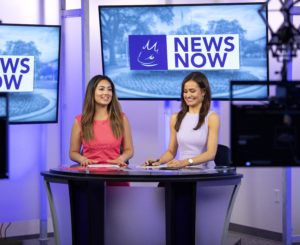 Two students anchor the News Now newscast.